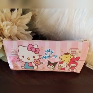 Hello kitty and friends pouch.